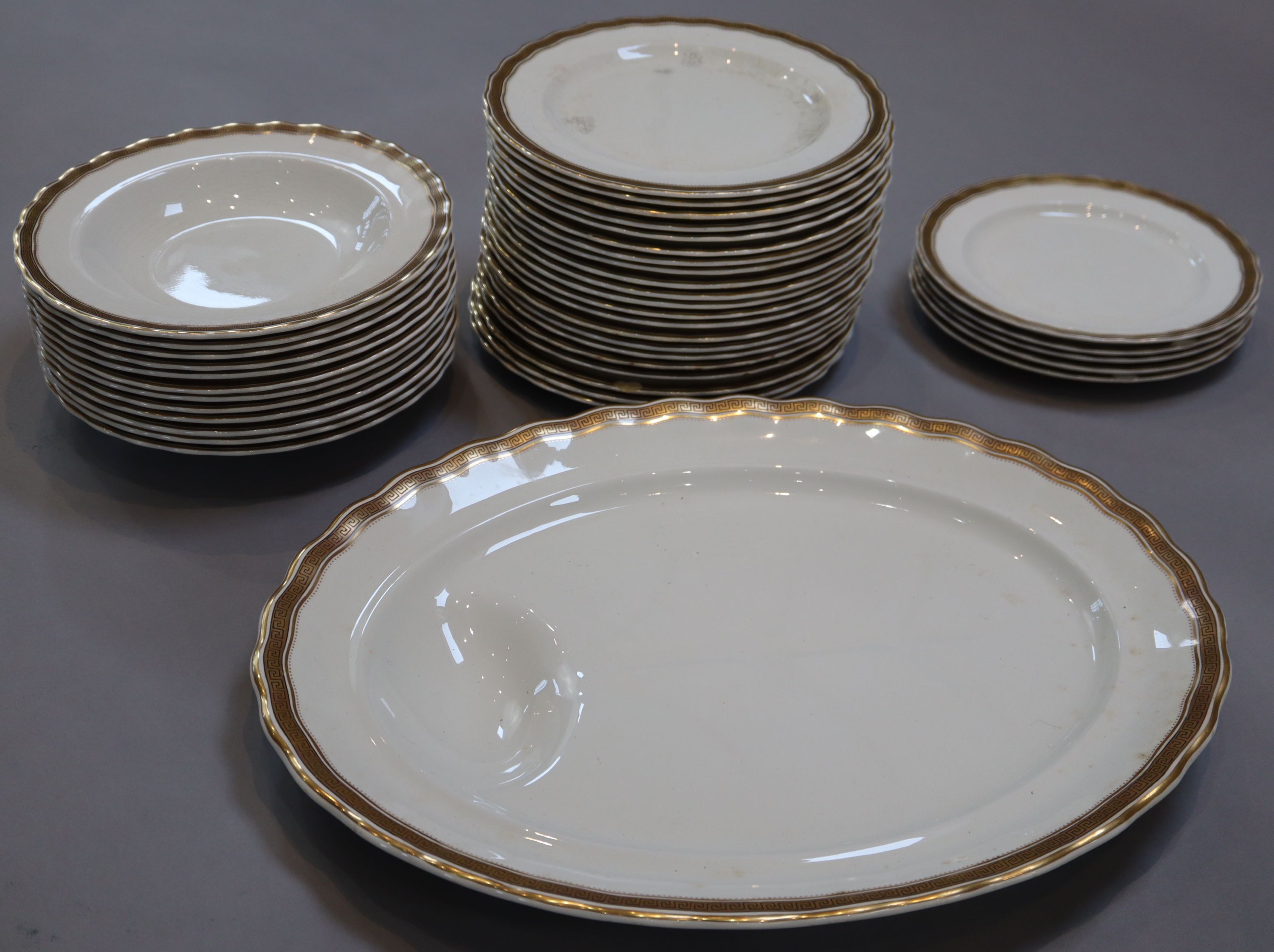 A Thomas Furnival & Sons fifty three piece part dinner service,
